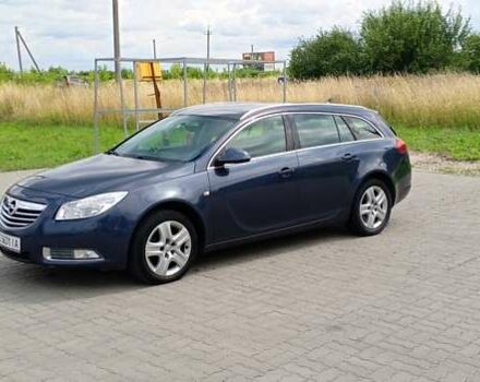 Синий Опель Инсигния, объемом двигателя 2 л и пробегом 255 тыс. км за 5650 $, фото 1 на Automoto.ua