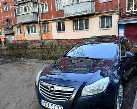 Синий Опель Инсигния, объемом двигателя 2 л и пробегом 350 тыс. км за 4000 $, фото 1 на Automoto.ua