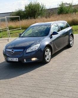 Синій Опель Інсігнія, об'ємом двигуна 1.96 л та пробігом 257 тис. км за 5250 $, фото 1 на Automoto.ua