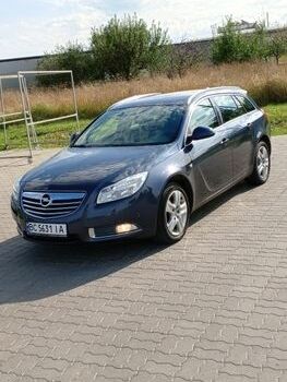 Синий Опель Инсигния, объемом двигателя 1.96 л и пробегом 257 тыс. км за 5250 $, фото 1 на Automoto.ua