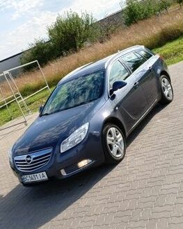 Синий Опель Инсигния, объемом двигателя 1.96 л и пробегом 257 тыс. км за 5500 $, фото 1 на Automoto.ua