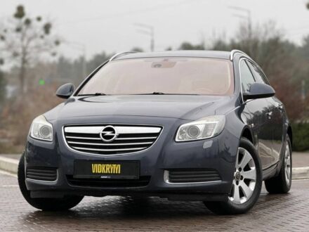 Синий Опель Инсигния, объемом двигателя 2 л и пробегом 306 тыс. км за 6800 $, фото 1 на Automoto.ua