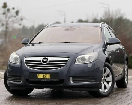 Синий Опель Инсигния, объемом двигателя 2 л и пробегом 306 тыс. км за 6800 $, фото 1 на Automoto.ua