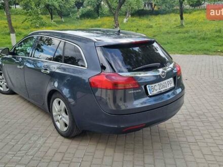 Синий Опель Инсигния, объемом двигателя 1.96 л и пробегом 298 тыс. км за 5900 $, фото 1 на Automoto.ua