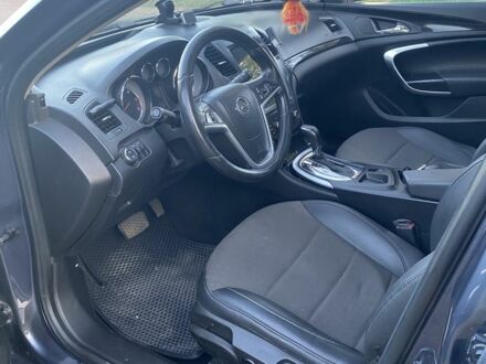 Синий Опель Инсигния, объемом двигателя 2 л и пробегом 320 тыс. км за 8100 $, фото 1 на Automoto.ua