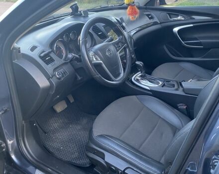 Синій Опель Інсігнія, об'ємом двигуна 2 л та пробігом 320 тис. км за 8100 $, фото 1 на Automoto.ua