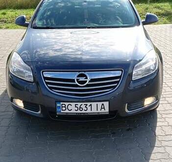 Синий Опель Инсигния, объемом двигателя 2 л и пробегом 252 тыс. км за 6299 $, фото 1 на Automoto.ua