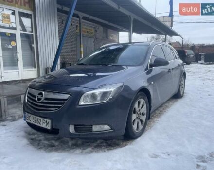 Синий Опель Инсигния, объемом двигателя 2 л и пробегом 320 тыс. км за 3600 $, фото 1 на Automoto.ua
