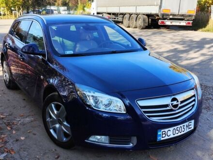 Синий Опель Инсигния, объемом двигателя 2 л и пробегом 325 тыс. км за 6200 $, фото 1 на Automoto.ua