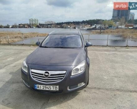 Синий Опель Инсигния, объемом двигателя 2 л и пробегом 267 тыс. км за 8000 $, фото 1 на Automoto.ua