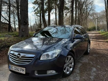 Синий Опель Инсигния, объемом двигателя 2 л и пробегом 350 тыс. км за 5750 $, фото 1 на Automoto.ua