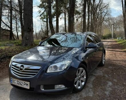 Синий Опель Инсигния, объемом двигателя 2 л и пробегом 350 тыс. км за 5750 $, фото 1 на Automoto.ua