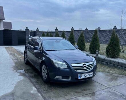 Синий Опель Инсигния, объемом двигателя 2 л и пробегом 303 тыс. км за 4950 $, фото 1 на Automoto.ua
