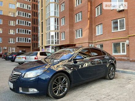 Синий Опель Инсигния, объемом двигателя 2 л и пробегом 265 тыс. км за 6950 $, фото 1 на Automoto.ua