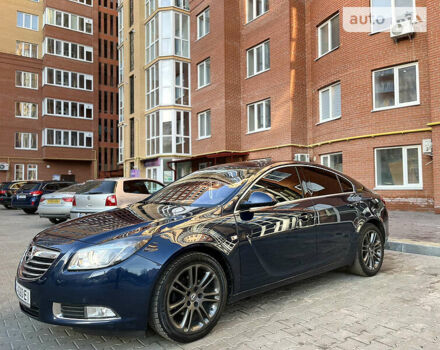 Синий Опель Инсигния, объемом двигателя 2 л и пробегом 265 тыс. км за 6950 $, фото 1 на Automoto.ua