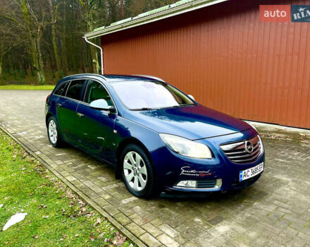 Синий Опель Инсигния, объемом двигателя 2 л и пробегом 260 тыс. км за 6800 $, фото 1 на Automoto.ua