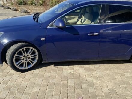 Синий Опель Инсигния, объемом двигателя 2 л и пробегом 345 тыс. км за 7500 $, фото 1 на Automoto.ua