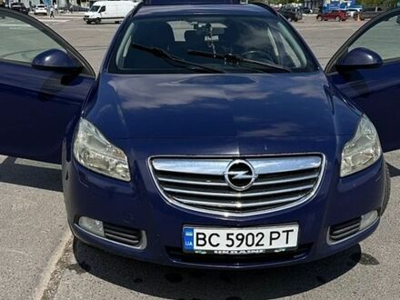 Синий Опель Инсигния, объемом двигателя 2 л и пробегом 253 тыс. км за 7500 $, фото 1 на Automoto.ua
