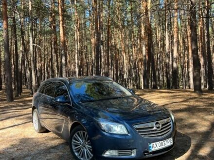Синій Опель Інсігнія, об'ємом двигуна 2 л та пробігом 200 тис. км за 6709 $, фото 1 на Automoto.ua