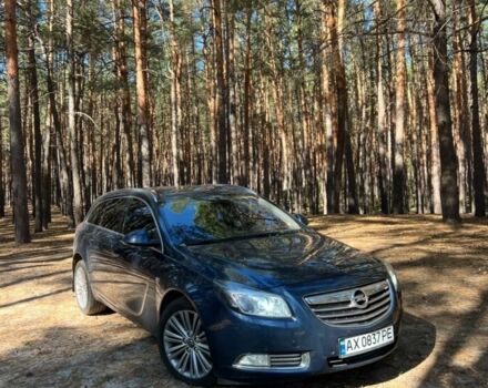Синий Опель Инсигния, объемом двигателя 2 л и пробегом 200 тыс. км за 6709 $, фото 1 на Automoto.ua