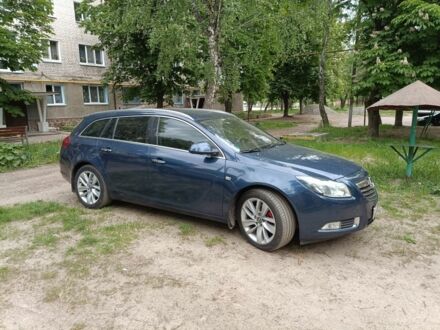 Синий Опель Инсигния, объемом двигателя 2 л и пробегом 218 тыс. км за 8800 $, фото 1 на Automoto.ua