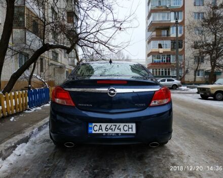 Синій Опель Інсігнія, об'ємом двигуна 2 л та пробігом 82 тис. км за 13700 $, фото 1 на Automoto.ua