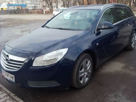 Синий Опель Инсигния, объемом двигателя 2 л и пробегом 249 тыс. км за 8600 $, фото 1 на Automoto.ua