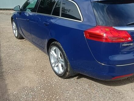 Синий Опель Инсигния, объемом двигателя 2 л и пробегом 220 тыс. км за 8300 $, фото 1 на Automoto.ua