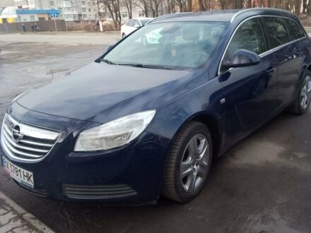 Синий Опель Инсигния, объемом двигателя 2 л и пробегом 249 тыс. км за 8600 $, фото 1 на Automoto.ua