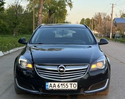 Синий Опель Инсигния, объемом двигателя 2 л и пробегом 319 тыс. км за 8500 $, фото 1 на Automoto.ua