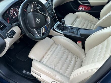 Синий Опель Инсигния, объемом двигателя 2 л и пробегом 252 тыс. км за 9400 $, фото 1 на Automoto.ua