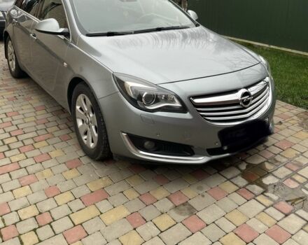 Синий Опель Инсигния, объемом двигателя 2 л и пробегом 247 тыс. км за 9500 $, фото 1 на Automoto.ua