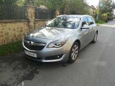 Синий Опель Инсигния, объемом двигателя 2 л и пробегом 133 тыс. км за 14700 $, фото 1 на Automoto.ua