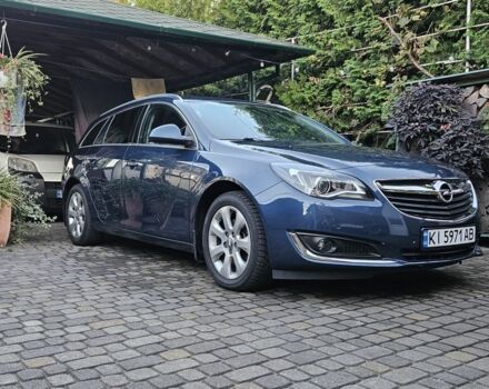 Синий Опель Инсигния, объемом двигателя 2 л и пробегом 105 тыс. км за 13999 $, фото 1 на Automoto.ua