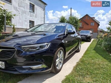 Синій Опель Інсігнія, об'ємом двигуна 2 л та пробігом 245 тис. км за 14800 $, фото 1 на Automoto.ua