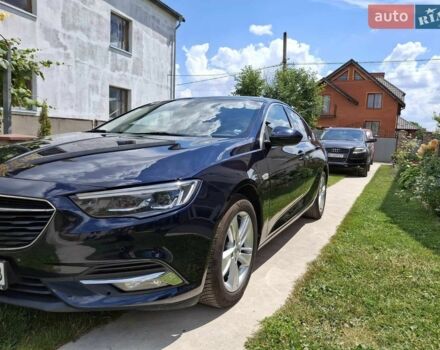 Синий Опель Инсигния, объемом двигателя 2 л и пробегом 245 тыс. км за 14800 $, фото 1 на Automoto.ua