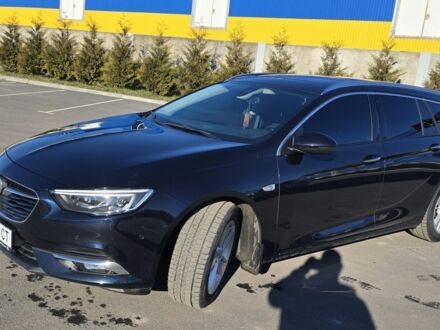 Синий Опель Инсигния, объемом двигателя 2 л и пробегом 189 тыс. км за 17000 $, фото 1 на Automoto.ua