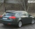 Зеленый Опель Инсигния, объемом двигателя 2 л и пробегом 254 тыс. км за 6550 $, фото 7 на Automoto.ua