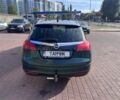 Зелений Опель Інсігнія, об'ємом двигуна 2 л та пробігом 400 тис. км за 6300 $, фото 1 на Automoto.ua