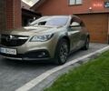 Зеленый Опель Инсигния, объемом двигателя 2 л и пробегом 221 тыс. км за 13499 $, фото 1 на Automoto.ua
