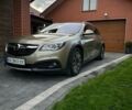 Зеленый Опель Инсигния, объемом двигателя 2 л и пробегом 221 тыс. км за 13499 $, фото 1 на Automoto.ua
