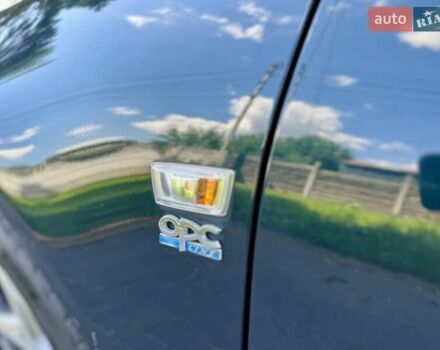 Зелений Опель Інсігнія, об'ємом двигуна 2 л та пробігом 257 тис. км за 9499 $, фото 9 на Automoto.ua