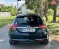 Зелений Опель Інсігнія, об'ємом двигуна 2 л та пробігом 257 тис. км за 9499 $, фото 4 на Automoto.ua