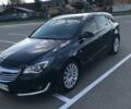 Зелений Опель Інсігнія, об'ємом двигуна 1.96 л та пробігом 210 тис. км за 10300 $, фото 3 на Automoto.ua
