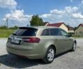 Зелений Опель Інсігнія, об'ємом двигуна 1.96 л та пробігом 250 тис. км за 8700 $, фото 1 на Automoto.ua