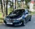 Зелений Опель Інсігнія, об'ємом двигуна 2 л та пробігом 257 тис. км за 9499 $, фото 1 на Automoto.ua