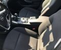 Зелений Опель Інсігнія, об'ємом двигуна 1.96 л та пробігом 210 тис. км за 10300 $, фото 7 на Automoto.ua