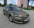 Зелений Опель Інсігнія, об'ємом двигуна 2 л та пробігом 116 тис. км за 11800 $, фото 1 на Automoto.ua