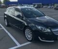 Зелений Опель Інсігнія, об'ємом двигуна 1.96 л та пробігом 215 тис. км за 10000 $, фото 3 на Automoto.ua