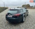 Зеленый Опель Инсигния, объемом двигателя 2 л и пробегом 255 тыс. км за 9199 $, фото 4 на Automoto.ua